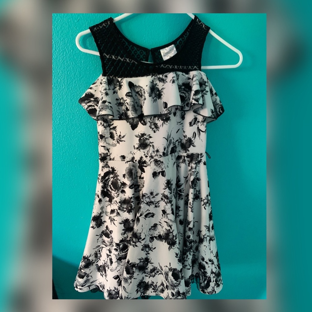 Selling dress with black flowers